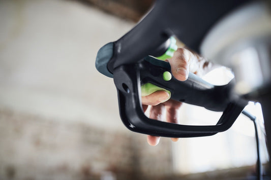 Festool MX 1000 RE Rührwerk mit Gasgebe-Schalter und grünem Schnellwechsel-System in Handposition
