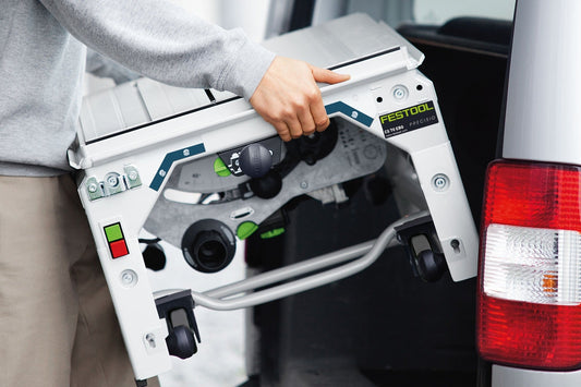 Festool Tischzugsäge CS 70 EBG PRECISIO mit Bedienelemente und Zubehör in Transportkoffer.