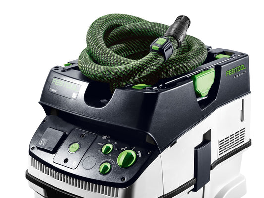 Festool CLEANTEC Absaugmobil mit grünem Saugschlauch und Bluetooth Fernbedienungsmodul auf der Oberseite.