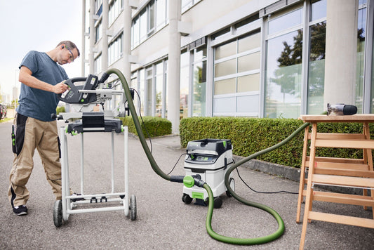 Festool Absauganlage mit Y-Ventil SV-AS D50 SWT im Einsatz auf Baustelle, zwei Schläuche angeschlossen