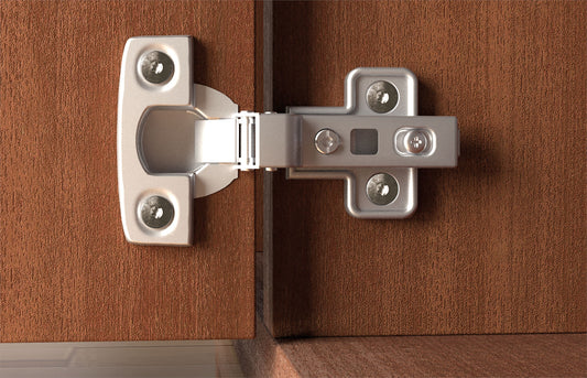 Detailansicht eines Möbelscharniers für Schranktüren mit verdeckter Montage.